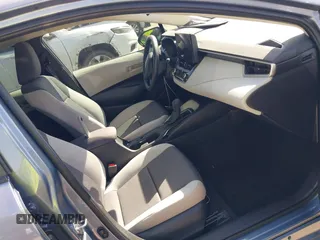 2023 Toyota Corolla LE z VIN 5YFB4MDE9PP004980, wystawiony jako IAAI lot #41788099 z przebiegiem 21 650 mil mil oraz . Historia ofert i sprzedaży dostępna na DreamBid. Obrazek 5.