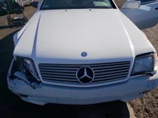 1995 Mercedes-Benz SL z VIN WDBFA63E8SF123853, wystawiony jako Copart lot #45917634 z przebiegiem 112 416 mil mil oraz Nie do naprawy. Historia ofert i sprzedaży dostępna na DreamBid. Obrazek 11.