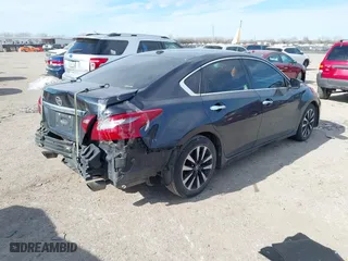 2018 Nissan Altima 2.5 SL with VIN 1N4AL3AP4JC283937, listed as a IAAI auction lot 41272679 with 120,374 mi miles. Bid and sale history available at carsss.com. Image 4.