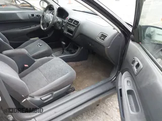 1999 Honda Civic EX z VIN 1HGEJ8241XL068738, wystawiony jako IAAI lot #42568778 z przebiegiem 202 590 mil mil oraz . Historia ofert i sprzedaży dostępna na DreamBid. Obrazek 5.