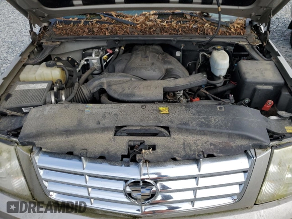 2006 Cadillac Escalade z VIN 1GYEK63N76R136618, wystawiony jako Copart lot #58990945 z przebiegiem Nie podano mil oraz Czysty tytuł • Clean title. Historia ofert i sprzedaży dostępna na DreamBid. Obrazek 12.