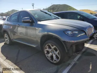 2014 BMW X6 50i with VIN 5UXFG8C56EL593069, listed as a Copart auction lot 41142944 with 89,321 mi miles and Clean Title. Bid and sale history available at carsss.com. Image 4.