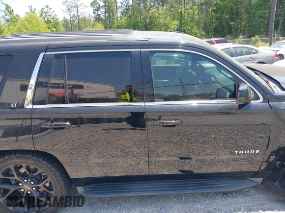 2016 Chevrolet Tahoe LT z VIN 1GNSCBKC0GR361339, wystawiony jako IAAI lot #42026931 z przebiegiem 123 927 mil mil oraz . Historia ofert i sprzedaży dostępna na DreamBid. Obrazek 13.