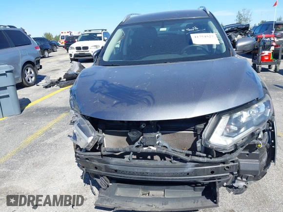 2017 Nissan Rogue S with VIN KNMAT2MT7HP617801, listed as a IAAI auction lot 41754527 with 156,195 mi miles and . Bid and sale history available at DreamBid. Image 6.