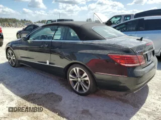 2015 Mercedes-Benz E 400 with VIN WDDKK6FFXFF301128, listed as a Copart auction lot 76691954 with 49,313 mi miles and Salvage title. Bid and sale history available at DreamBid. Image 2.