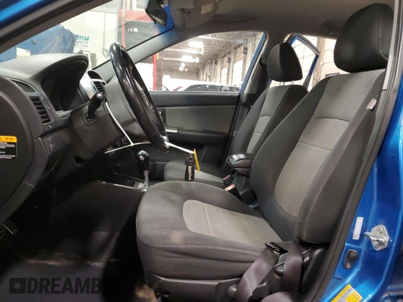 2007 Kia Spectra with VIN KNAFE161775007569, listed as a Copart auction lot 86778784 with 125,463 mi miles and Salvage Title. Bid and sale history available at carsss.com. Image 7.
