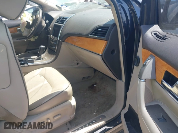 2014 Lincoln MKX with VIN 2LMDJ6JK8EBL13191, listed as a IAAI auction lot 42023811 with 212,793 mi miles. Bid and sale history available at carsss.com. Image 5.