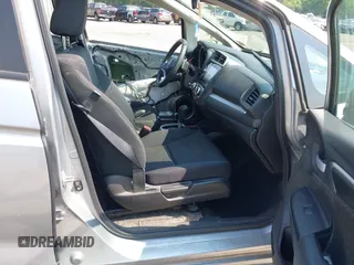 2020 Honda Fit EX with VIN 3HGGK5H85LM714354, listed as a IAAI auction lot 42471207 with 84,333 mi miles and . Bid and sale history available at DreamBid. Image 5.