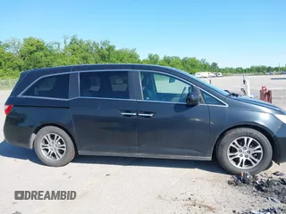 2011 Honda Odyssey EX-L with VIN 5FNRL5H66BB058333, listed as a IAAI auction lot 42172045 with 215,723 mi miles and . Bid and sale history available at carsss.com. Image 13.