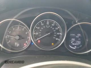 2016 Mazda CX-5 Touring z VIN JM3KE2CY4G0805072, wystawiony jako Copart lot #58435535 z przebiegiem 146 323 mil mil oraz Szkoda całkowita • Salvage title. Historia ofert i sprzedaży dostępna na DreamBid. Obrazek 9.