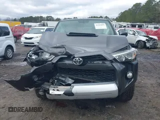 2014 Toyota 4Runner Limited with VIN JTEBU5JR4E5162629, listed as a IAAI auction lot 41265652 with 152,961 mi miles. Bid and sale history available at carsss.com. Image 12.
