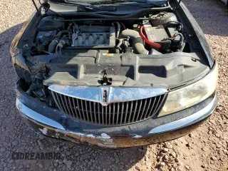 2001 Lincoln Continental with VIN 1LNHM97V61Y604213, listed as a Copart auction lot 52517535 with 112,391 mi miles and Salvage Title. Bid and sale history available at DreamBid. Image 12.