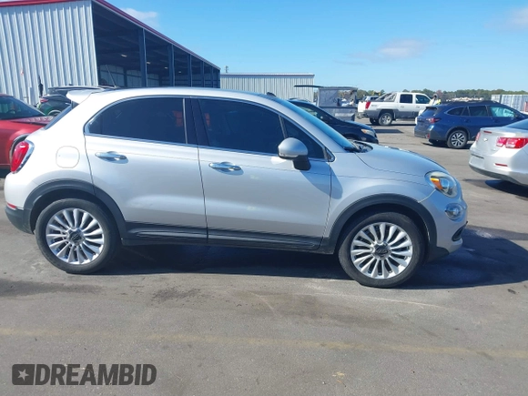 2016 FIAT 500X Lounge z VIN ZFBCFXDT2GP363767, wystawiony jako IAAI lot #37885612 z przebiegiem 74 859 mil mil oraz . Historia ofert i sprzedaży dostępna na DreamBid. Obrazek 13.