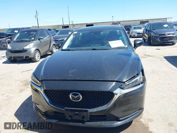 2020 Mazda 6 Sport with VIN JM1GL1UM2L1519932, listed as a IAAI auction lot 41712367 with 83,497 mi miles and . Bid and sale history available at DreamBid. Image 12.