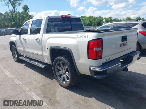 2014 GMC Sierra 1500 SLT with VIN 3GTU2VEC5EG548784, listed as a IAAI auction lot 42156738 with 118,809 mi miles and . Bid and sale history available at DreamBid. Image 3.