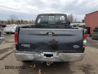 2000 Ford F-250 XL with VIN 1FTNX21L5YEC66604, listed as a Copart auction lot 51754055 with 167,798 mi miles and Salvage title. Bid and sale history available at DreamBid. Image 6.