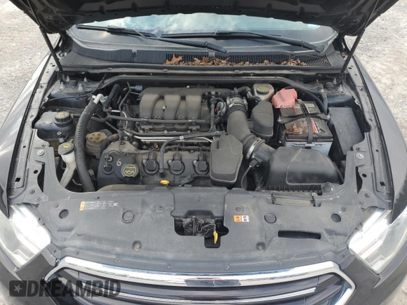 2014 Ford Taurus Limited z VIN 1FAHP2F85EG151167, wystawiony jako Copart lot #54376275 z przebiegiem 136 612 mil mil oraz Szkody całkowita. Historia ofert i sprzedaży dostępna na DreamBid. Obrazek 11.