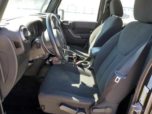2018 Jeep Wrangler Unlimited Sport S with VIN 1C4BJWDG8JL814090, listed as a Copart auction lot 49155145 with 74,875 mi miles and Salvage Title. Bid and sale history available at DreamBid. Image 7.