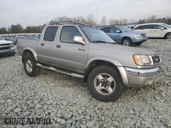 2000 Nissan Frontier XE with VIN 1N6ED27Y3YC366060, listed as a Copart auction lot 48955585 with 158,565 mi miles and Salvage title. Bid and sale history available at DreamBid. Image 4.