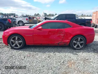 2012 Chevrolet Camaro 1LT z VIN 2G1FB1E3XC9203347, wystawiony jako IAAI lot #41261932 z przebiegiem 106 070 mil mil oraz . Historia ofert i sprzedaży dostępna na DreamBid. Obrazek 14.