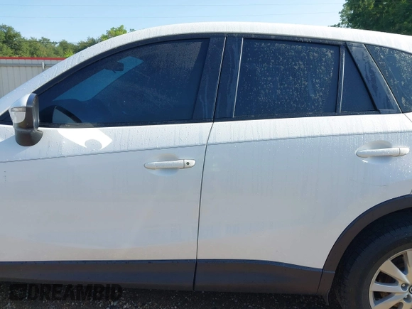 2015 Mazda CX-5 Sport with VIN JM3KE2BE6F0541469, listed as a IAAI auction lot 42632906 with 166,257 mi miles and . Bid and sale history available at DreamBid. Image 14.