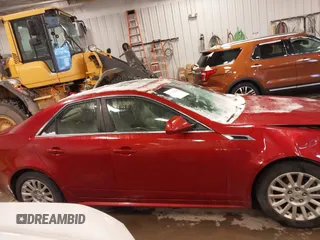 2011 Cadillac CTS Sedan Luxury with VIN 1G6DG5EY2B0165000, listed as a IAAI auction lot 41292834 with 114,101 mi miles. Bid and sale history available at carsss.com. Image 13.