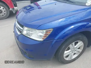 2012 Dodge Journey SXT with VIN 3C4PDCBB0CT323362, listed as a IAAI auction lot 42528338 with 187,995 mi miles and . Bid and sale history available at DreamBid. Image 6.