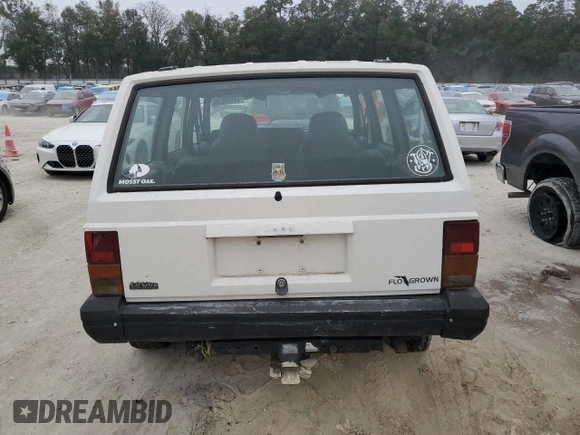1996 Jeep Cherokee SE z VIN 1J4FJ28S7TL256478, wystawiony jako Copart lot #47164985 z przebiegiem 195 800 mil mil oraz Nie do naprawy • Non repairable. Historia ofert i sprzedaży dostępna na DreamBid. Obrazek 6.