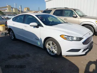 2018 Ford Fusion SE z VIN 3FA6P0LU4JR249042, wystawiony jako IAAI lot #42421073 z przebiegiem 98 979 mil mil oraz . Historia ofert i sprzedaży dostępna na DreamBid. Obrazek 1.