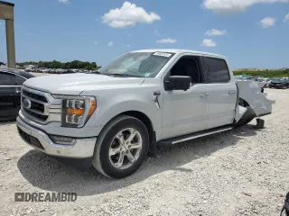 2021 Ford F-150 XL with VIN 1FTEW1CP2MKE62928, listed as a Copart auction lot 59882525 with 32,481 mi miles and Salvage title. Bid and sale history available at DreamBid. Image 1.