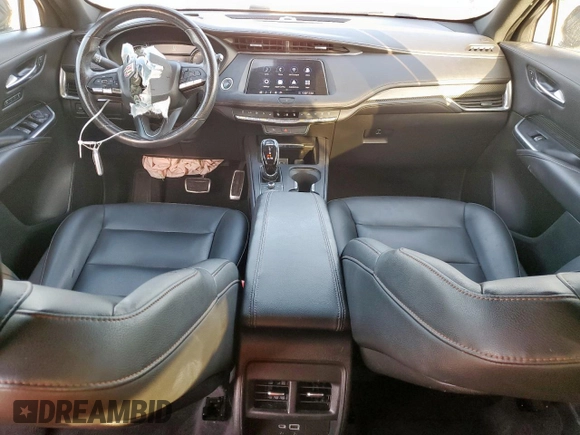 2020 Cadillac XT4 FWD Sport with VIN 1GYFZER45LF146781, listed as a Copart auction lot 65171615 with 65,177 mi miles and Salvage title. Bid and sale history available at DreamBid. Image 8.