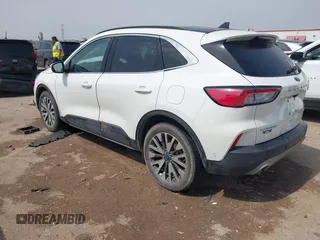 2020 Ford Escape Titanium Hybrid with VIN 1FMCU0DZ9LUA54867, listed as a IAAI auction lot 42268245 with 68,974 mi miles and . Bid and sale history available at DreamBid. Image 3.