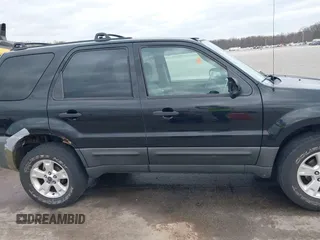 2005 Ford Escape XLT with VIN 1FMCU03135KB37656, listed as a IAAI auction lot 41908207 with 191,899 mi miles. Bid and sale history available at carsss.com. Image 13.