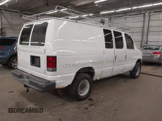 2006 Ford Econoline Cargo with VIN 1FTSE34LX6DA21553, listed as a IAAI auction lot 41980604 with 285,592 mi miles. Bid and sale history available at carsss.com. Image 4.