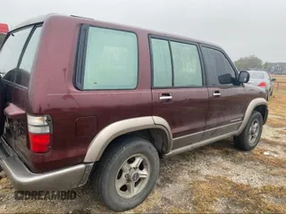 2002 Isuzu Trooper S with VIN JACDS58X727J02138, listed as a IAAI auction lot 41455245 with 186,560 mi miles and . Bid and sale history available at DreamBid. Image 4.