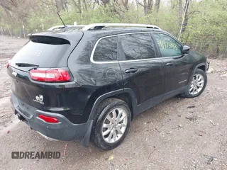 2015 Jeep Cherokee Limited with VIN 1C4PJMDS4FW698875, listed as a IAAI auction lot 41975033 with 163,580 mi miles. Bid and sale history available at carsss.com. Image 4.