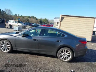 2017 Mazda 6 Touring with VIN JM1GL1V54H1130336, listed as a IAAI auction lot 41586397 with 114,076 mi miles and . Bid and sale history available at DreamBid. Image 14.
