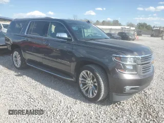 2016 Chevrolet Suburban LTZ with VIN 1GNSCJKC5GR363954, listed as a Copart auction lot 50562365 with 189,077 mi miles and Salvage title. Bid and sale history available at DreamBid. Image 4.