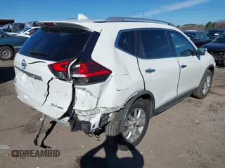 2017 Nissan Rogue SV with VIN KNMAT2MV9HP584589, listed as a IAAI auction lot 41692956 with 111,294 mi miles and . Bid and sale history available at carsss.com. Image 4.