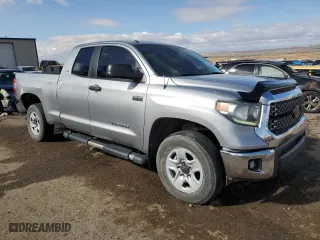 2018 Toyota Tundra 4WD SR with VIN 5TFUY5F17JX714885, listed as a Copart auction lot 48469155 with 183,665 mi miles and Salvage Title. Bid and sale history available at carsss.com. Image 4.