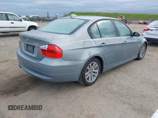 2007 BMW 3 Series 328i with VIN WBAVC53527FZ72561, listed as a IAAI auction lot 41891455 with 146,096 mi miles and . Bid and sale history available at carsss.com. Image 4.