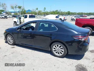 2023 Toyota Camry LE z VIN 4T1C11AK2PU120803, wystawiony jako IAAI lot #42060384 z przebiegiem 38 897 mil mil oraz . Historia ofert i sprzedaży dostępna na DreamBid. Obrazek 12.