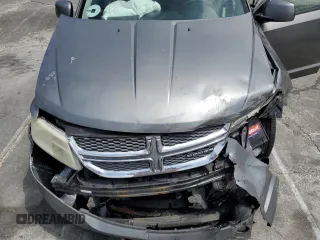 2012 Dodge Journey SXT with VIN 3C4PDCBG6CT207952, listed as a Copart auction lot 60334565 with Not provided miles and Salvage title. Bid and sale history available at DreamBid. Image 11.