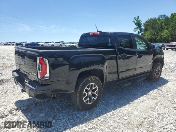 2015 GMC Canyon 4WD SLE with VIN 1GTG6BE32F1115990, listed as a Copart auction lot 71295314 with 118,913 mi miles and Salvage Title. Bid and sale history available at carsss.com. Image 5.