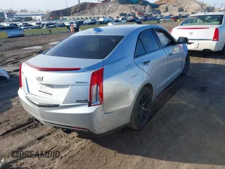 2018 Cadillac ATS RWD z VIN 1G6AA5RX7J0173114, wystawiony jako IAAI lot #41592867 z przebiegiem 50 393 mil mil oraz . Historia ofert i sprzedaży dostępna na DreamBid. Obrazek 4.