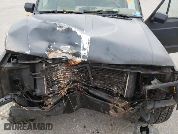 1994 Jeep Cherokee Sport with VIN 1J4FT68S0RL177339, listed as a Copart auction lot 47237805 with 207,156 mi miles and Salvage Title. Bid and sale history available at carsss.com. Image 11.