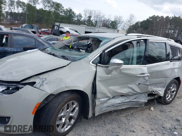 2017 Chrysler Pacifica Limited with VIN 2C4RC1GG9HR560544, listed as a IAAI auction lot 41807810 with 137,768 mi miles and . Bid and sale history available at DreamBid. Image 14.