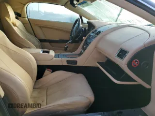 2008 Aston Martin Vantage z VIN SCFBF04B18GD08076, wystawiony jako Copart lot #70620153 z przebiegiem Nie podano mil oraz . Historia ofert i sprzedaży dostępna na DreamBid. Obrazek 7.