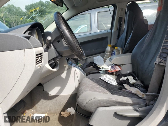 2007 Dodge Caliber SXT z VIN 1B3HB48B57D364154, wystawiony jako Copart lot #58973225 z przebiegiem 205 693 mil mil oraz Szkoda całkowita • Salvage title. Historia ofert i sprzedaży dostępna na DreamBid. Obrazek 7.