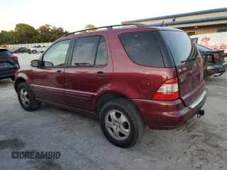 2002 Mercedes-Benz M-Class with VIN 4JGAB54E72A300774, listed as a Copart auction lot 75990134 with 312,541 mi miles and Salvage Title. Bid and sale history available at carsss.com. Image 2.
